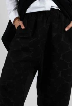 Moyuru Trousers^Circle Print Trousers in Black