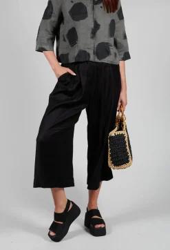 Les Filles d'Ailleurs Trousers^Pleated Wide Leg Trousers in Black