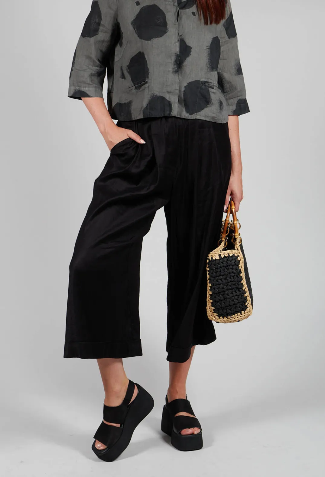 Les Filles d'Ailleurs Trousers^Pleated Wide Leg Trousers in Black