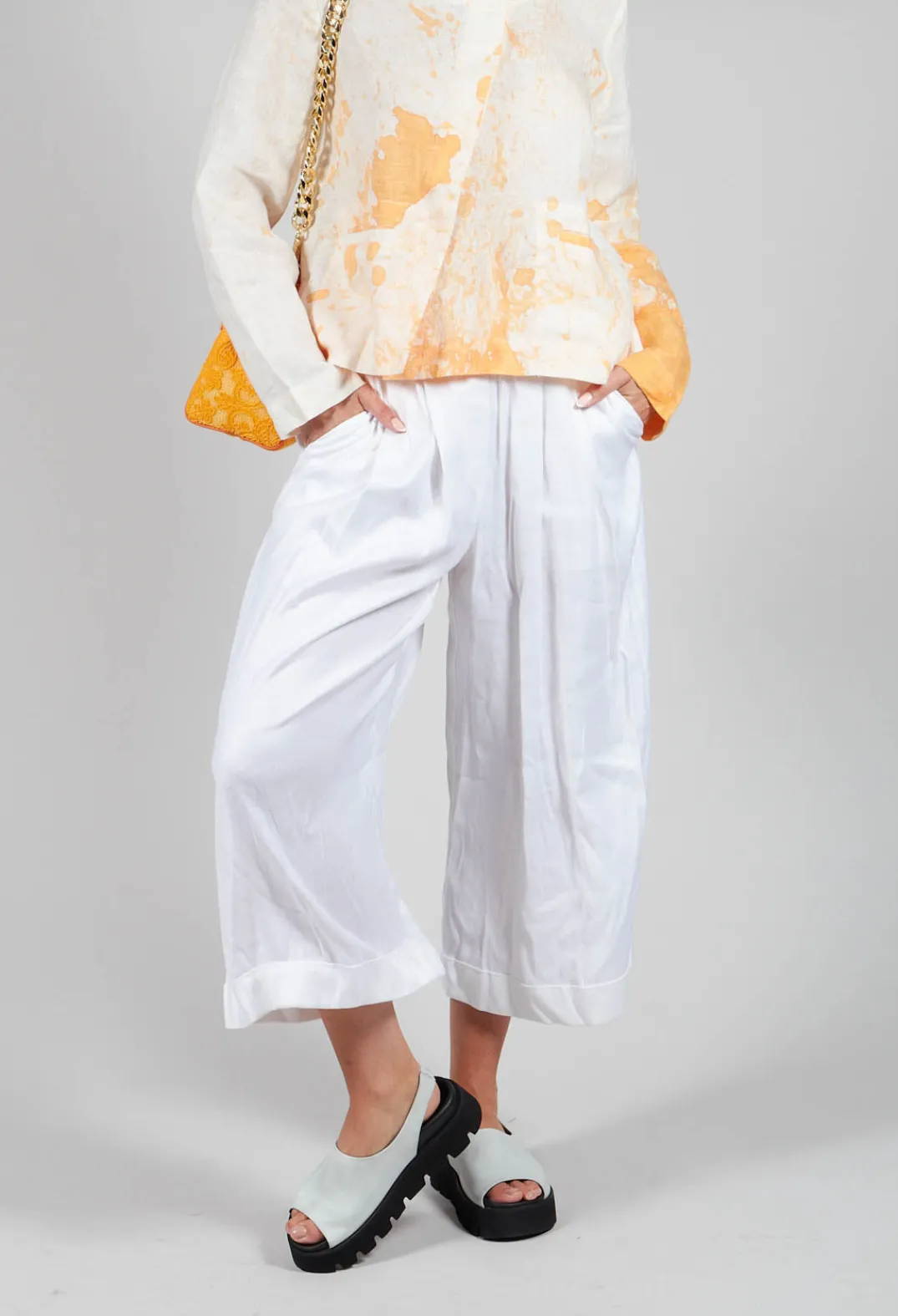 Les Filles d'Ailleurs Trousers^Pleated Wide Leg Trousers in White