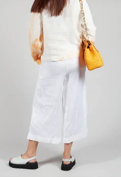 Les Filles d'Ailleurs Trousers^Pleated Wide Leg Trousers in White