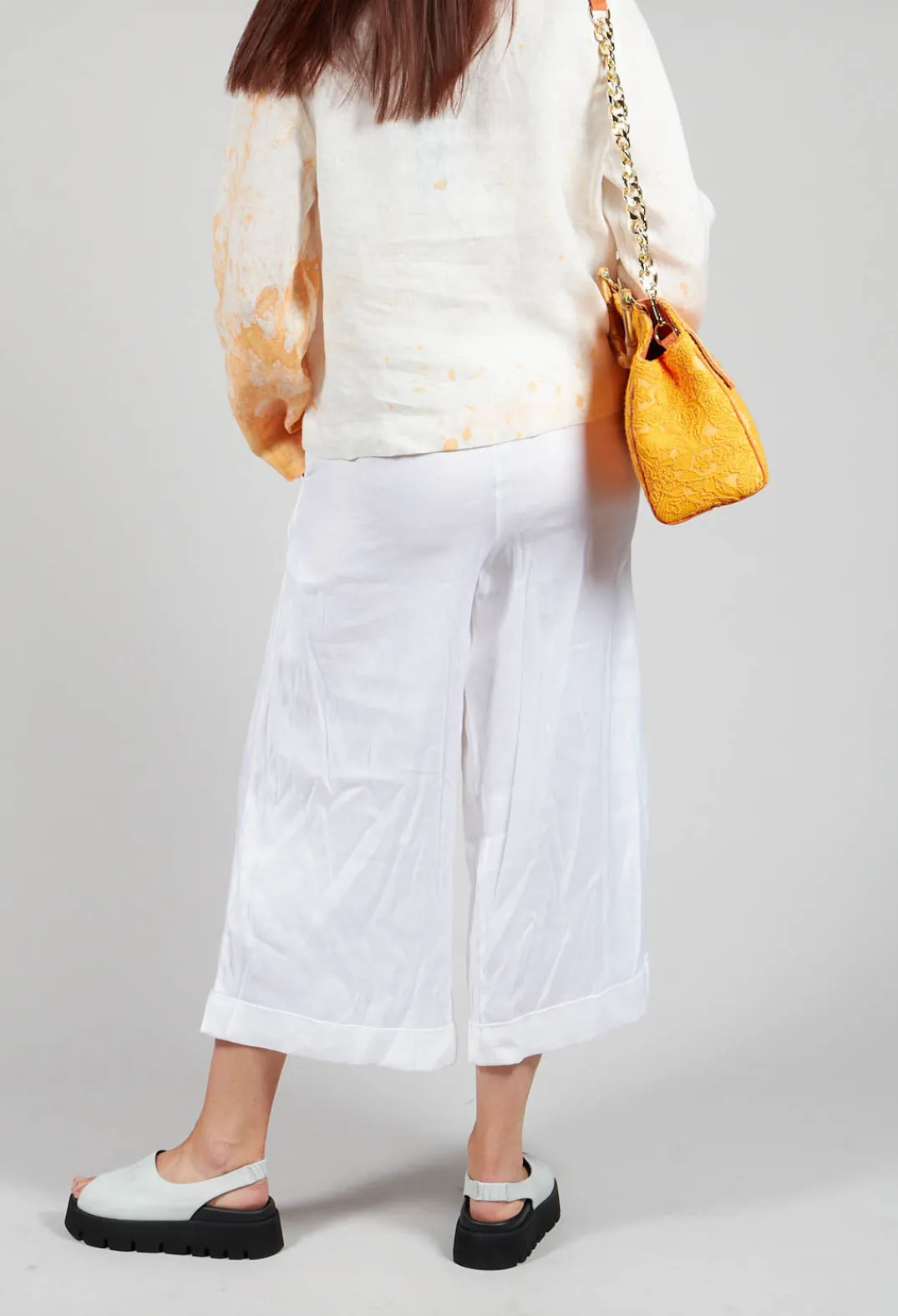 Les Filles d'Ailleurs Trousers^Pleated Wide Leg Trousers in White